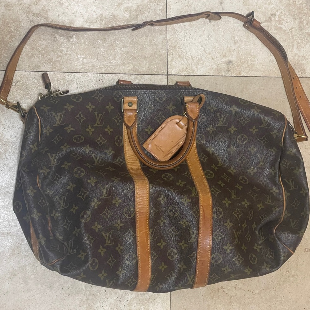Louis Vuitton duffle that has been put to good use